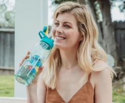 Silver Buffalo Disney Lilo & Stitch Tropical Water Bottle With Time Table | Holds 28 Ounces -Baby Land Shop GUEST 9b832df2 d1de 4742 ad4d 00c58b3fd5a5